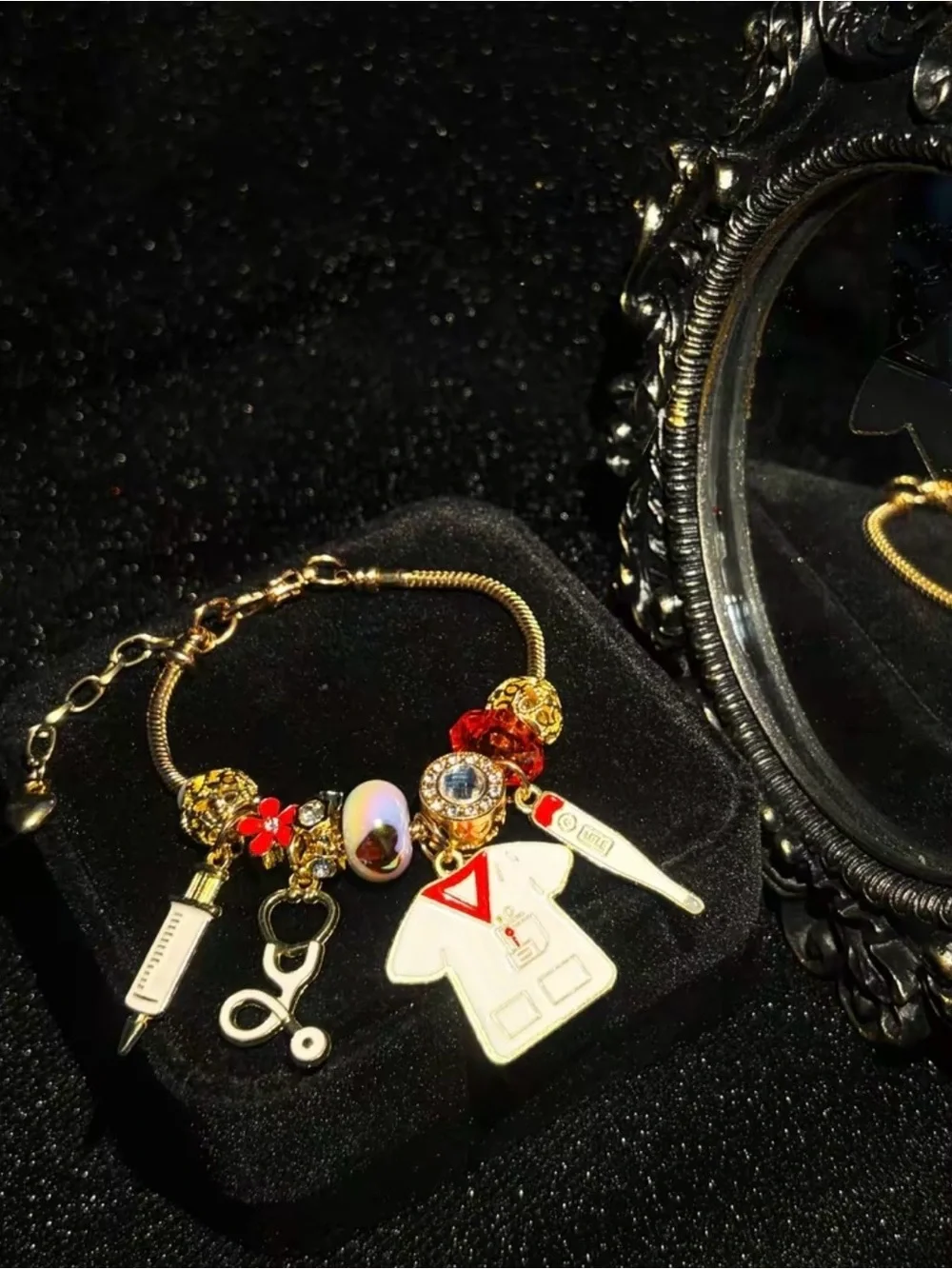 Gold-Tone Nurse Charm Bracelet with White and Red Accents